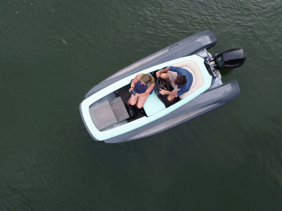 Guests aboard the Realms Drift 340 at speed